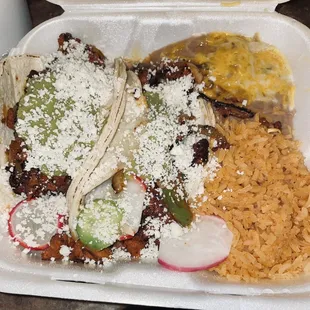 El Pastor Tacos with rice and beans (added my own cotija cheese)