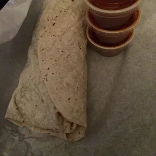 Carne asada burrito with yummy hot sauce