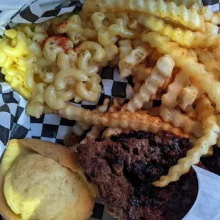 Meatloaf with mac and cheese and seasoned crinkles. Comes with cornbread too.