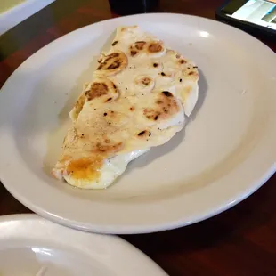 Plain cheese quesadilla. Flour tortillas were a touch thick.