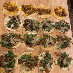 Guisada with cheese, asada, and two rows of el pastor. 10/10