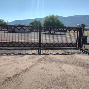 Gate damaged by Eric's Flower Market delivery person