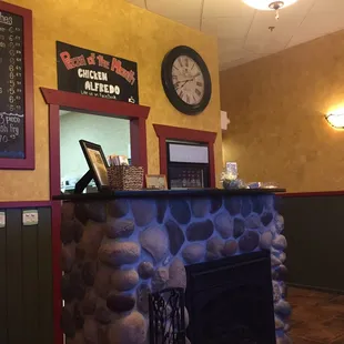 Cute inside ... Two tables and two counters to eats at