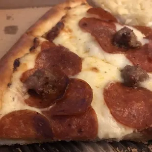 Large half pepperoni and Italian sausage with a creamy garlic sauce.