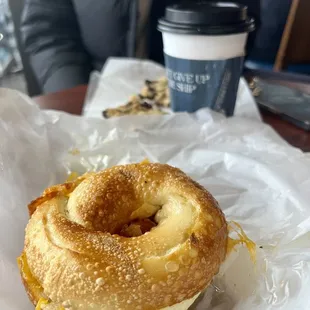 a bagel sandwich with cheese