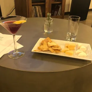 Vegan cheese options and a cocktail