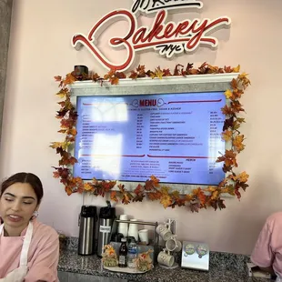 a woman working behind the counter