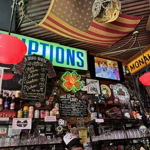 a bar with signs and balloons