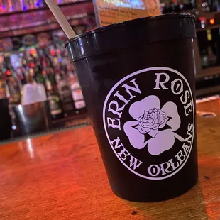 a cup of coffee on a bar