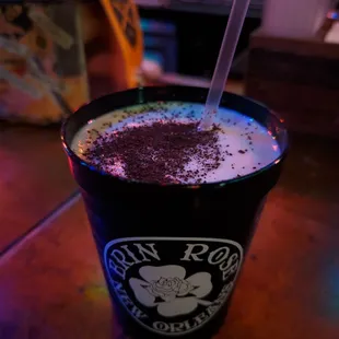 a cup of coffee on a table