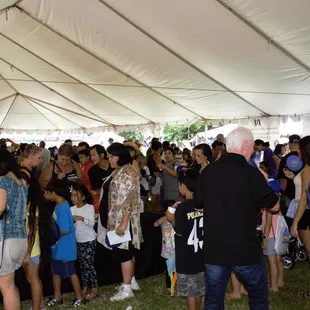 More keiki and their parents lining up for some refreshing shave ice