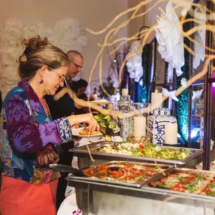 a woman serving food