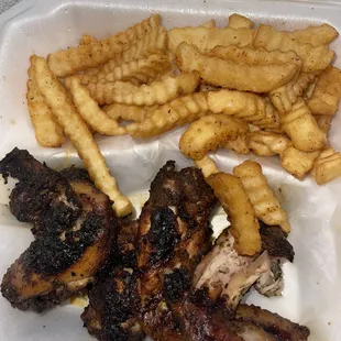 6 wings and fires. The wings look like they were picked on already or he just left half the meat on the grill after he burnt them.