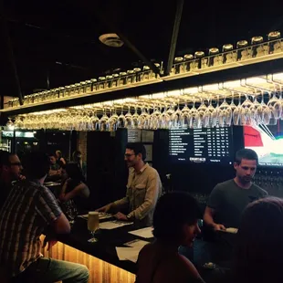 One of the Erman brothers tending bar