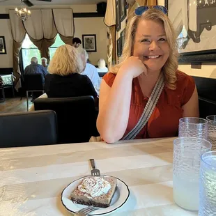 Pretty lady and brownie with French chocolate pudding on top