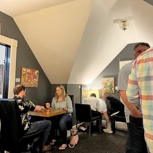 Upstairs Bar/lounge, crowded and muggy. Cash only, ATM available.
