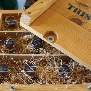 a wooden box filled with chocolates
