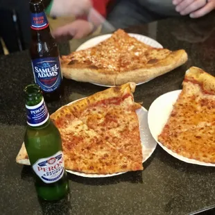 three slices of pizza and a beer