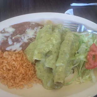 Flautas smothered with green chile con queso