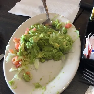 Half devoured large guacamole. This cool, creamy goodness is a winner.