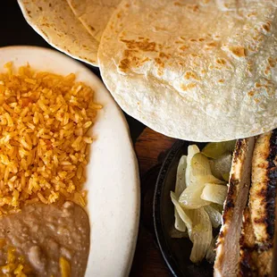 a burrito, rice, and beans