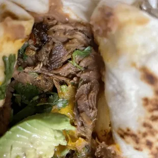 a beef and lettuce burrito