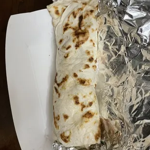 a burrito wrapped in foil