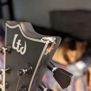 Cracked/chipped too of guitar