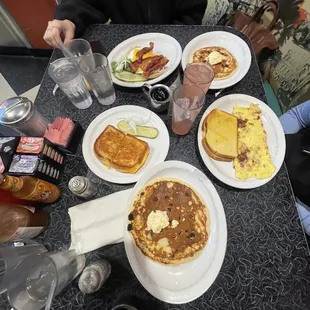 Grilled cheese, chocolate chip pancake, Ham/Cheese/Bacon Omlet, Breakfast Sandwich