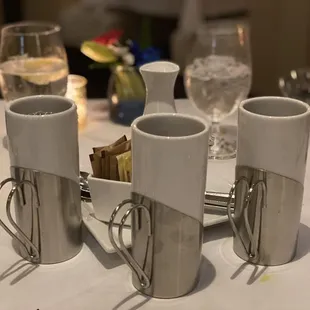 three mugs on a serving tray