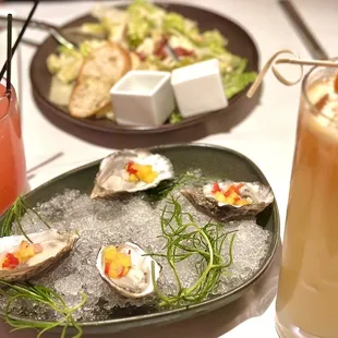 Raspberry Smash, Mai Thai, Caesar Salad, and Marin Gem oysters with mango salsa and micro cilantro