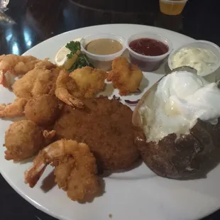 Pick two meal fried shrimp and crab cake with baked potatoes and salad.