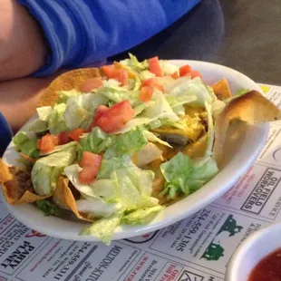 Make your own Nachos beef, lettuce and tomatoes.