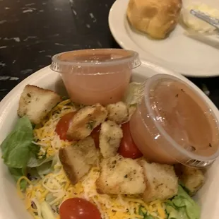 My side salad with their house made vinaigrette.  One of their rolls and butter which were delicious.