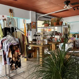 a clothing store with clothes on racks