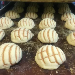 a baking pan filled with freshly baked pastries