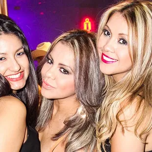 three women posing for a picture