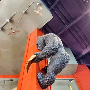 King Kong holding a slice of pizza!