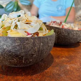 a woman sitting in the background