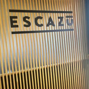 the escazu logo on the wall