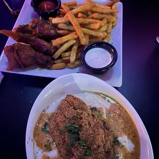 Chicken and fries fish and grits