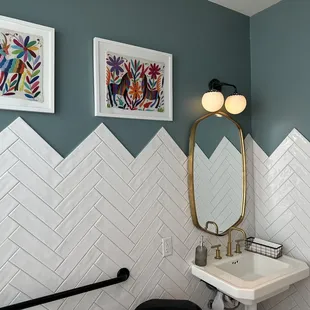 a bathroom with a toilet and sink