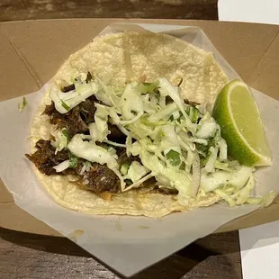 a close up of a taco