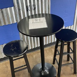 a table and two stools