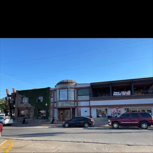 cars parked in front of a building