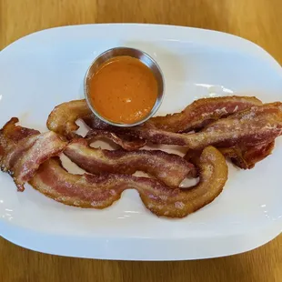 Side order of Bacon with a spicy sauce