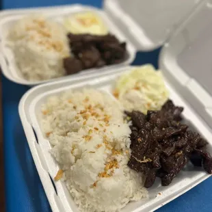 two trays of rice and beef