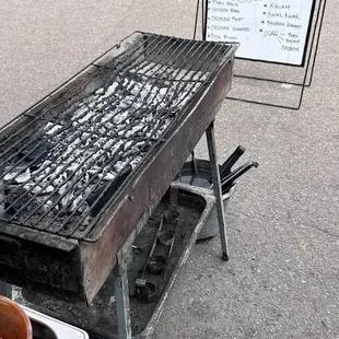 Outside: charcoal grill out front