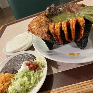 Molcajete comes with a side of rice and beans