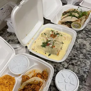 Chicken tacos kid plate, al pastor burrito with queso, 3 taco platter